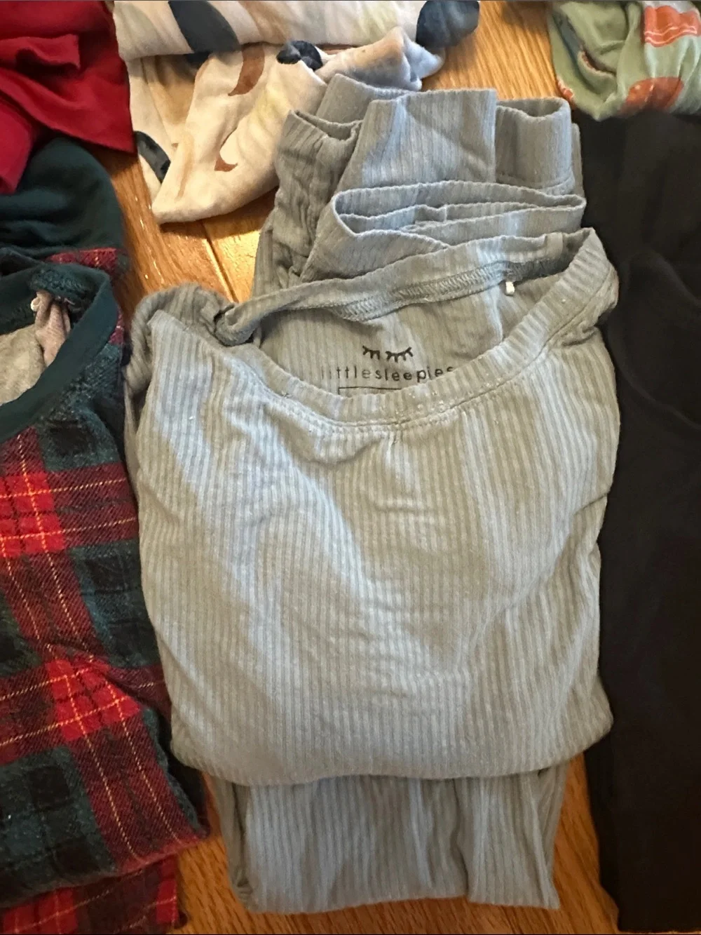 8 sets of Little Sleepies pajamas